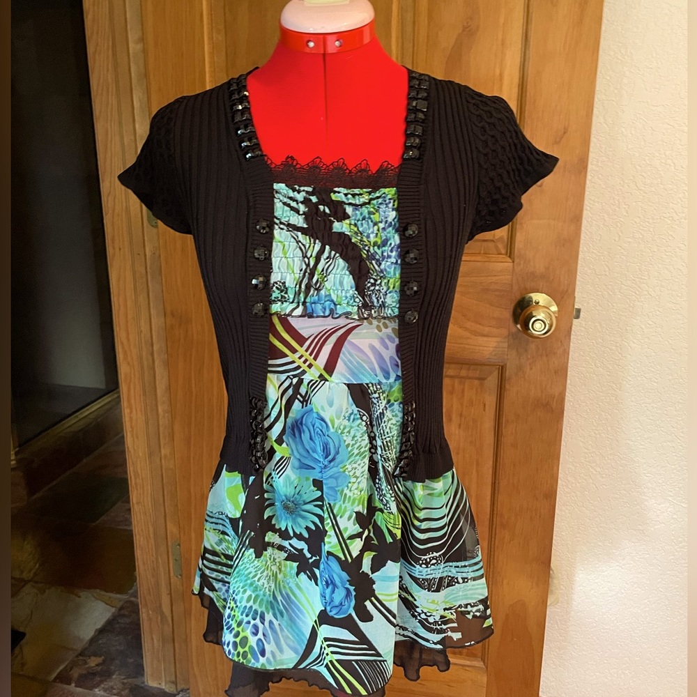 small, black and multi colored blousy top, one piece